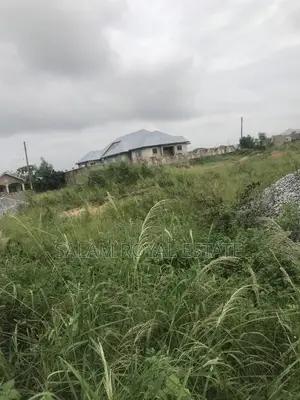 One Plot of Land With Wall at Amasaman Kasoa Road
