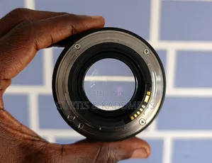 Canon EF 50mm F1.4 Lens 99% New With Lens Hood