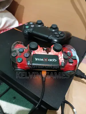 PS4 Standard 1TB With 2 Controllers and Games