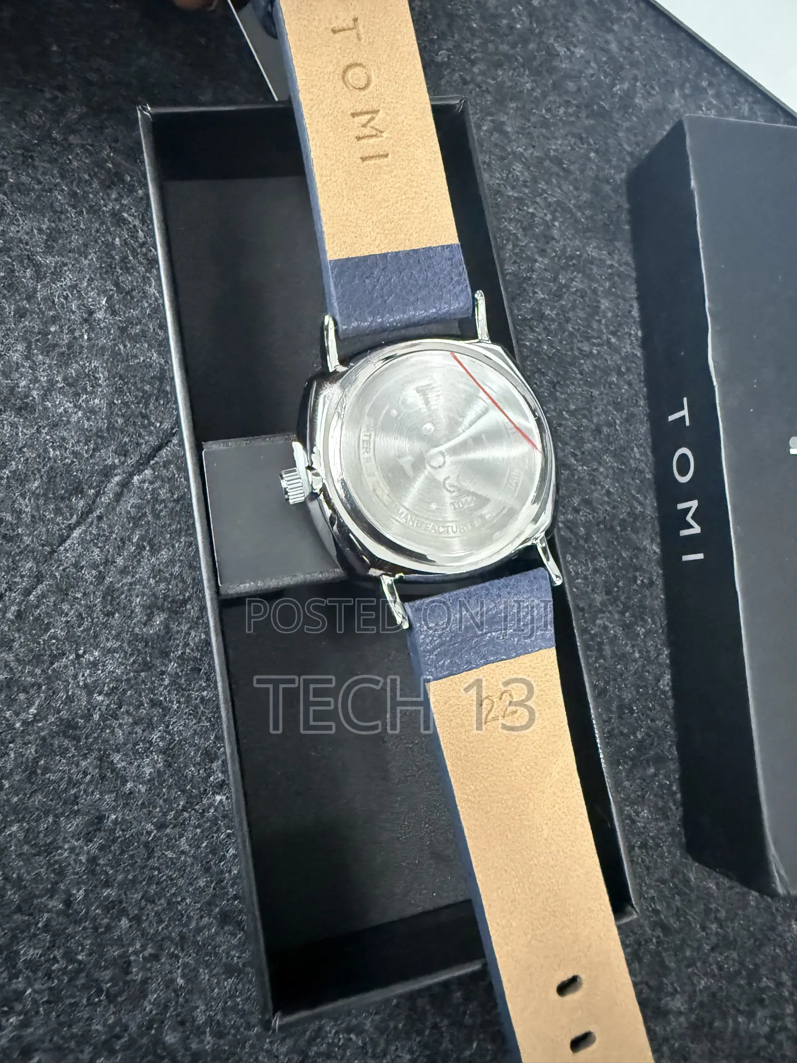 TOMI Watch