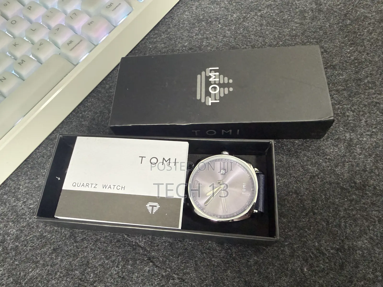TOMI Watch