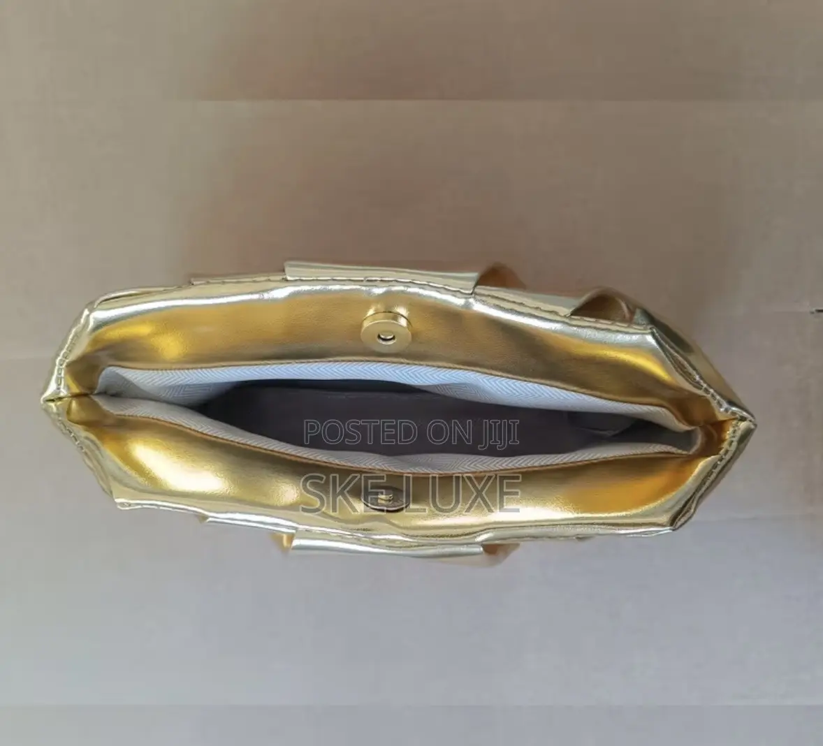 Luxury Metallic Dumpling Clutch Bag - (Gold and Silver)