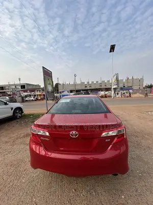 Toyota Camry SE 4dr Sedan w/Prod. End 11/13 (2.5L 4cyl 6A) 2014 Red