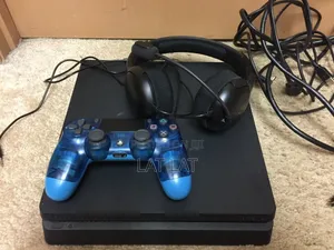 PS4 Slim Home Used With 17 Games