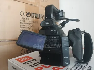 Canon C100 With 18-135mm Lens