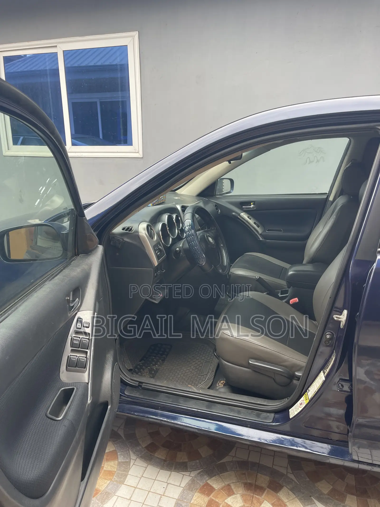 Toyota Matrix Hatchback AWD (1.8L 4cyl 4A) 2006 Blue