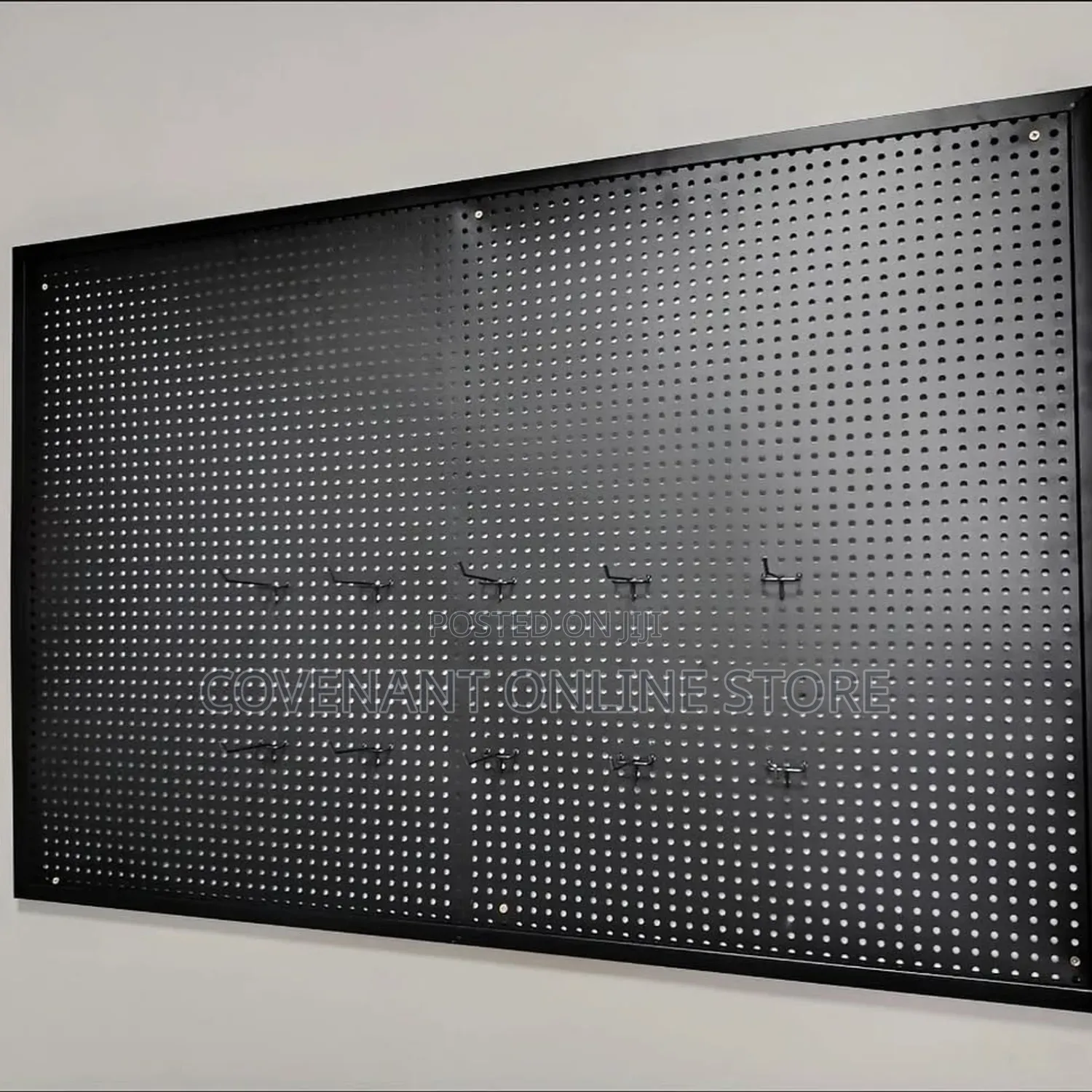 Aesthetic Black Metallic Pegboard With Hooks.