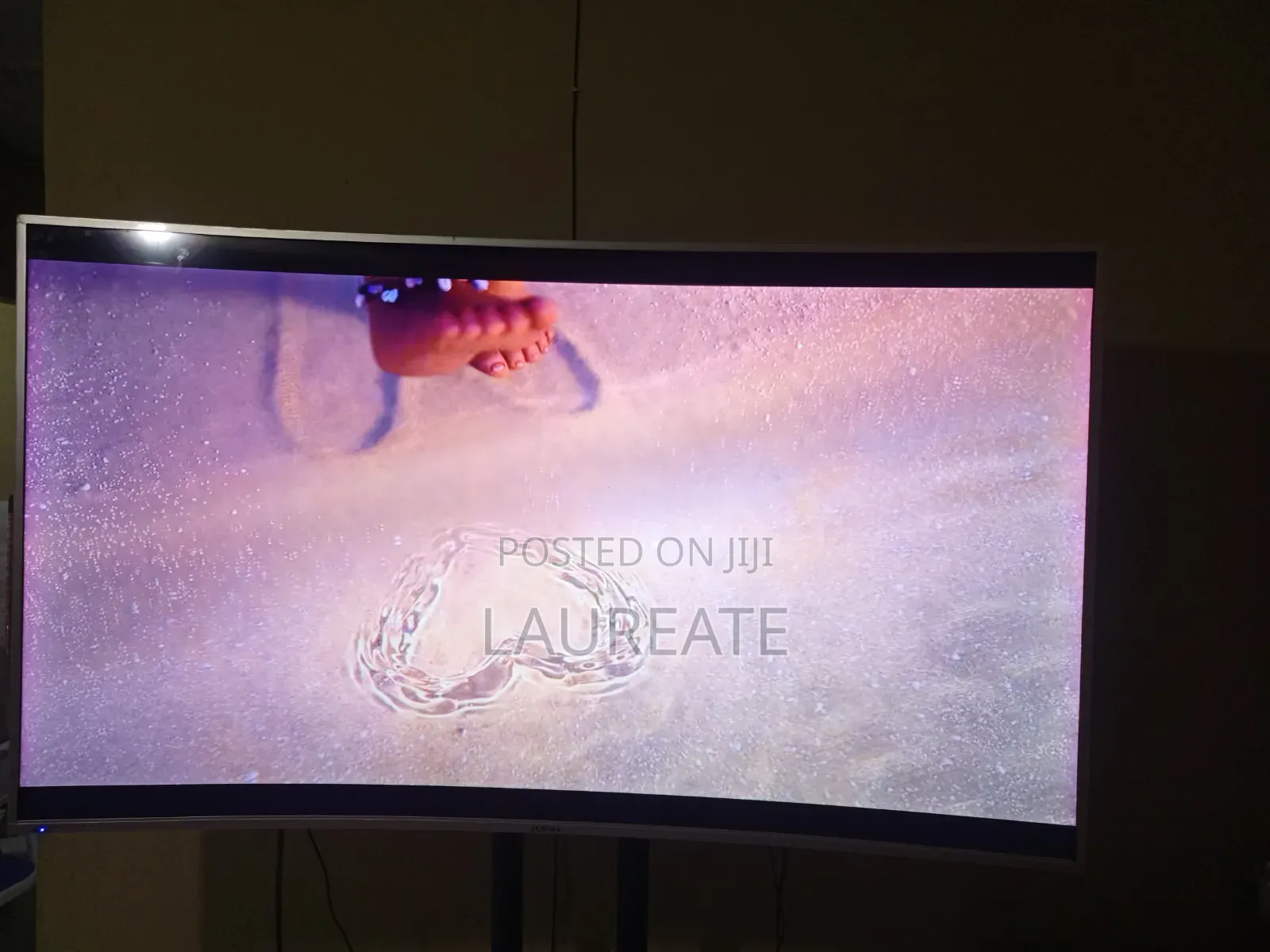 Used 65 Inch Curved UHD TV