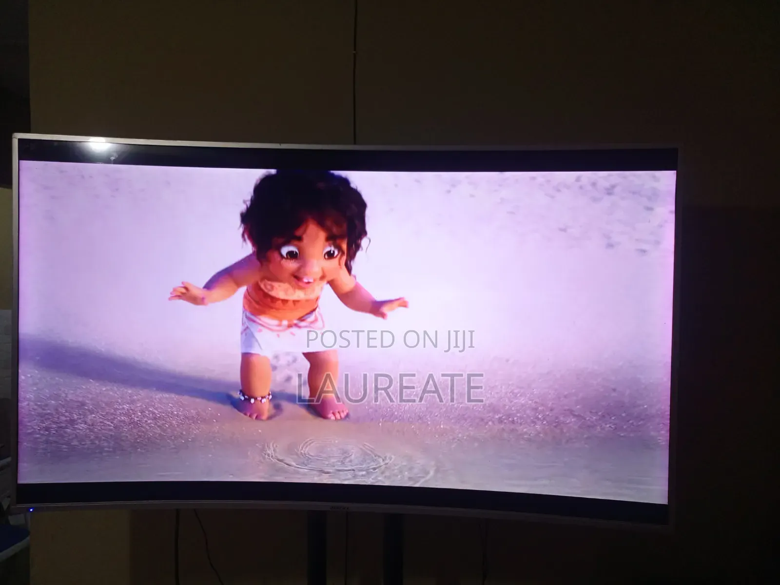 Used 65 Inch Curved UHD TV