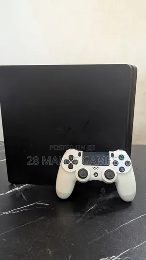 PS4 Slim With 7 Games and One Controller Very Neat Console