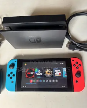 Nintendo Switch With All Accessories and FC 26, MK 11