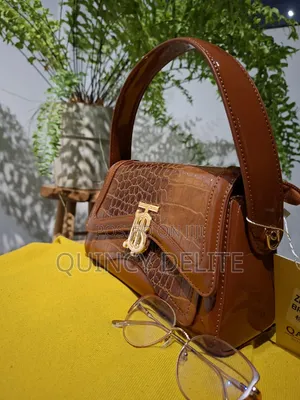 Glossy Brown Ladies Qaza Handbag