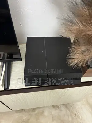 PS4 Standard With Games and 2 Controllers
