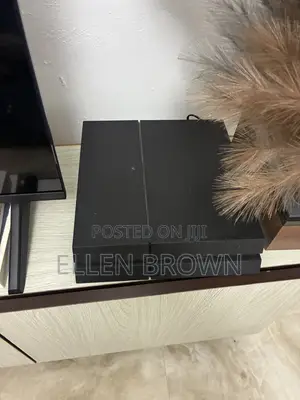 PS4 Standard With Games and 2 Controllers