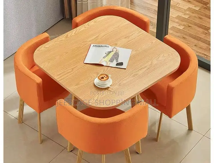The Modern Square Dining Table Set With 4 Orange Upholstered Chairs