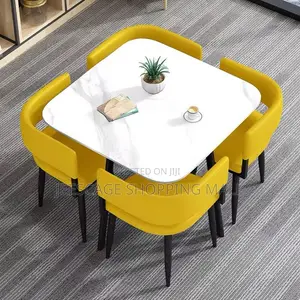 The Modern Square Dining Table Set With 4 Orange Upholstered Chairs