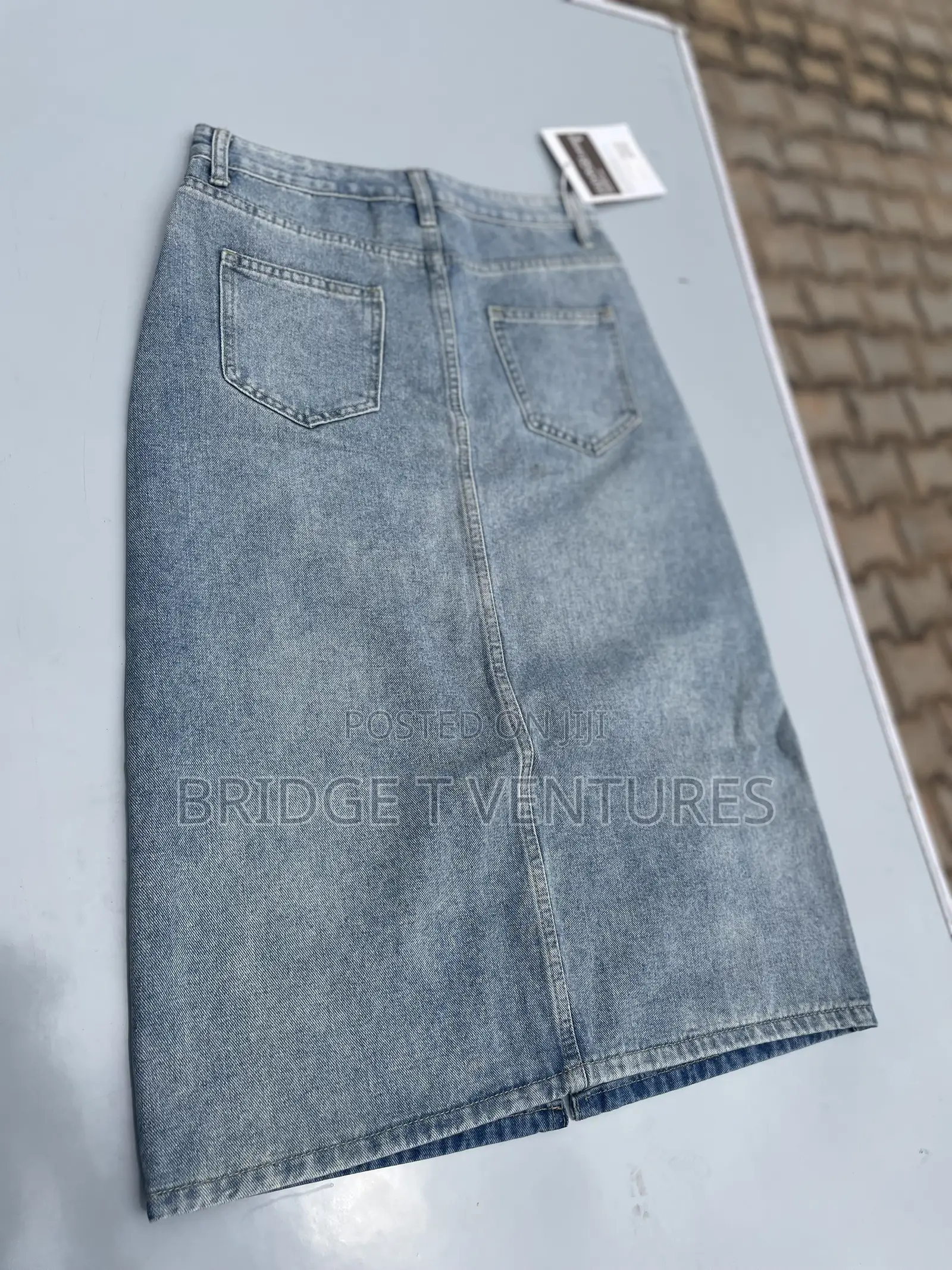 Light Wash Denim Midi Skirt With Front Slit