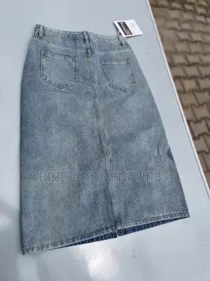 Light Wash Denim Midi Skirt With Front Slit