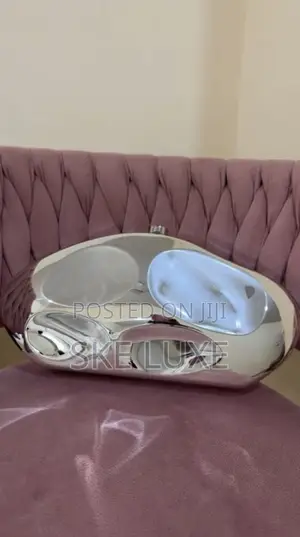 Luxury Metallic Sculpted Clutch Bag