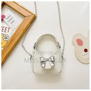 Metallic Bow Mini Handbag and Crossbody Strap