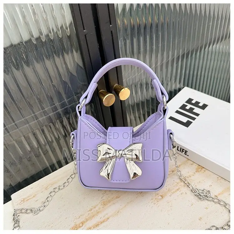 Metallic Bow Mini Handbag and Crossbody Strap