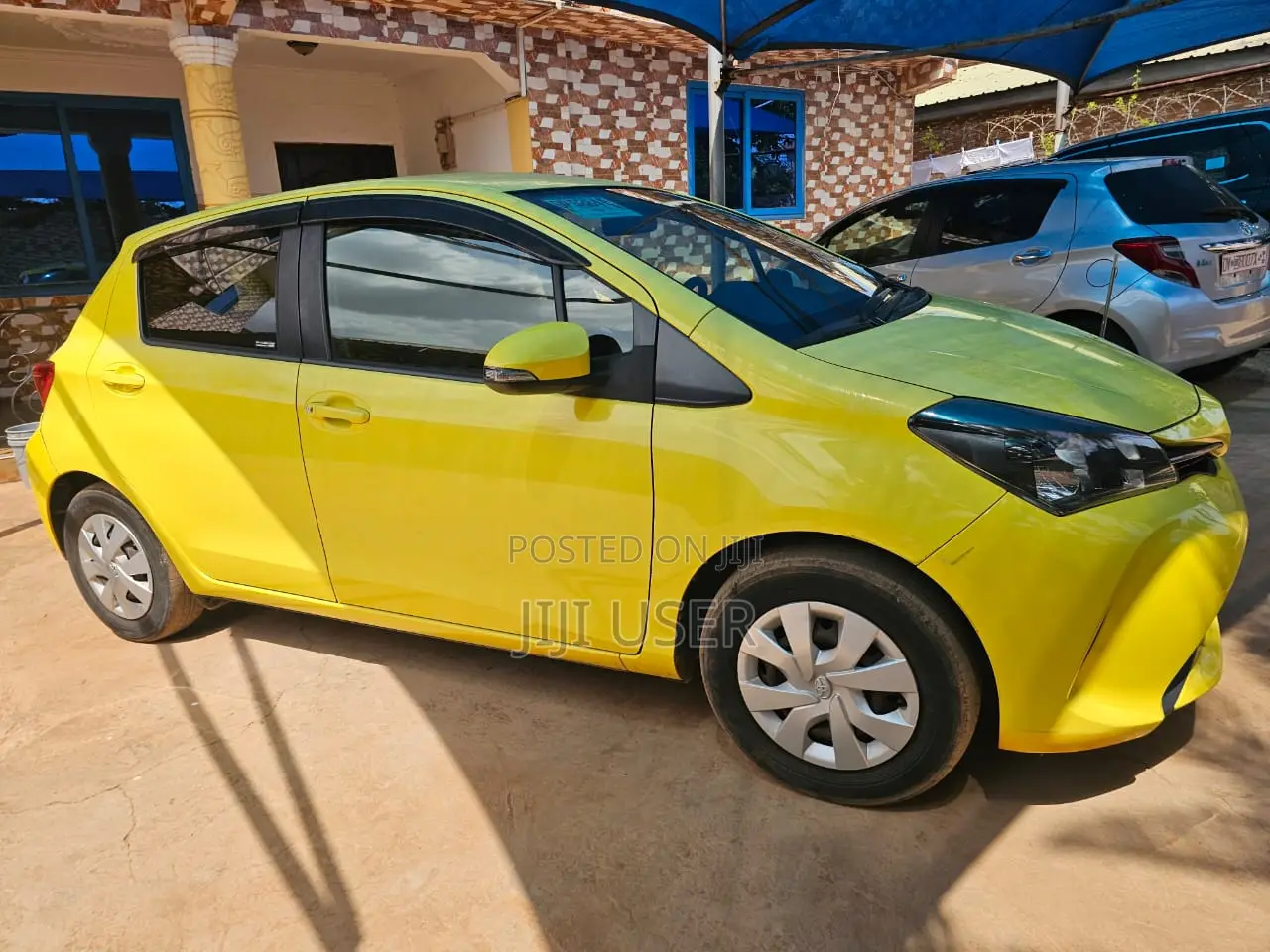 Toyota Vitz 2014 Yellow