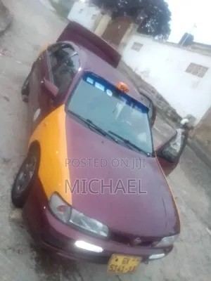 Nissan Almera 1998 Burgundy