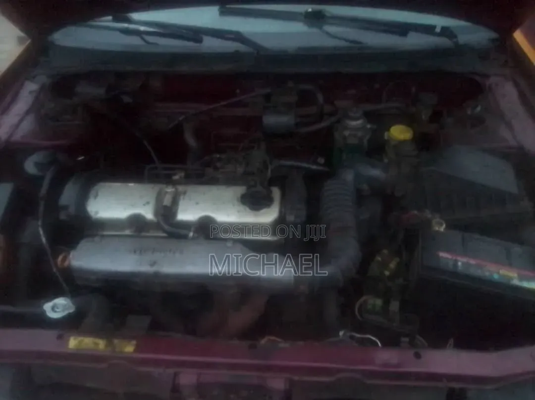 Nissan Almera 1998 Burgundy