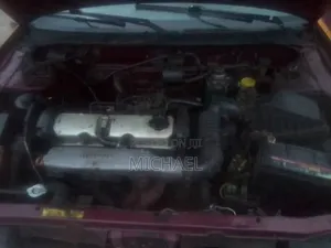 Nissan Almera 1998 Burgundy