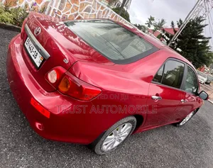 Toyota Corolla LE 4dr Sedan (1.8L 4cyl 4A) 2010 Red