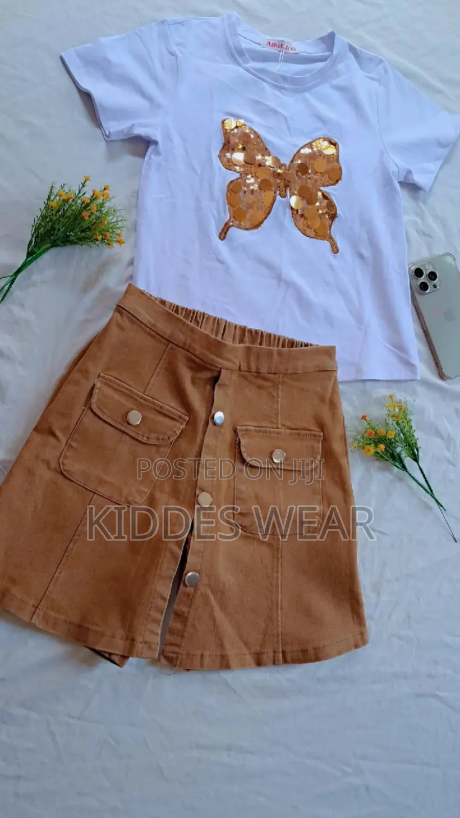 This Is a Three-Piece Children's Outfit Laid Out Flat,