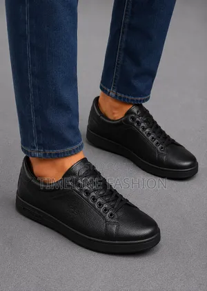 All Black Lacoste Leather Lace Up Sneakers