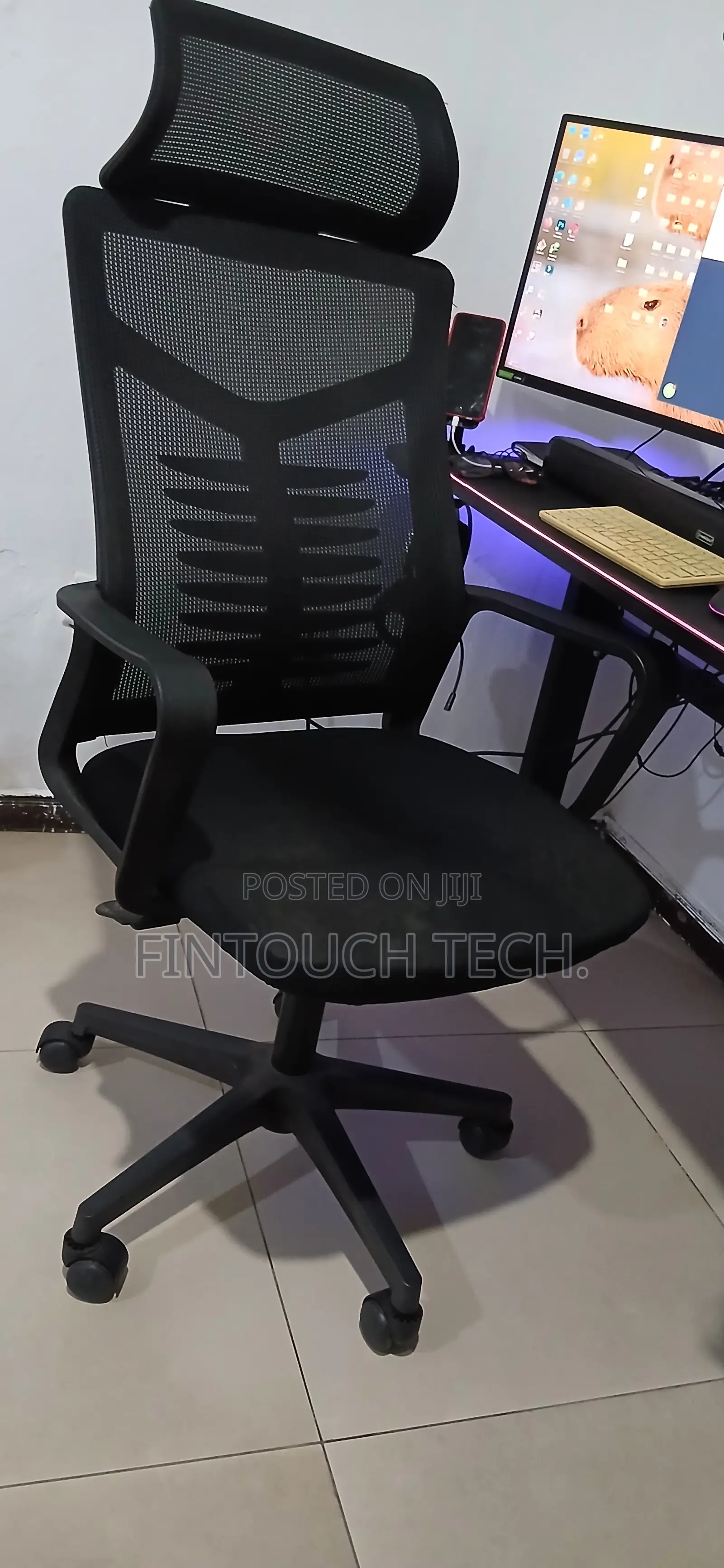 Ergonomic Swivel Chair With Durable Mesh and Head Rest for Your Office
