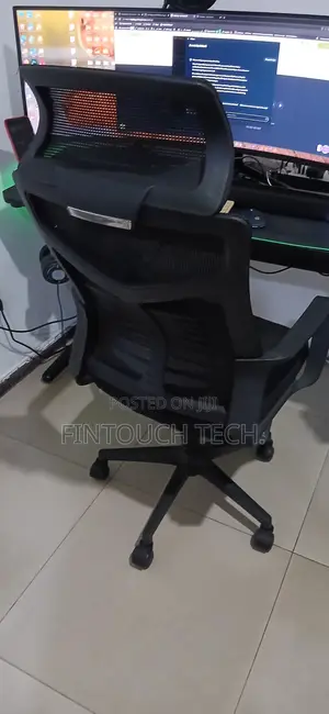 Ergonomic Swivel Chair With Durable Mesh and Head Rest for Your Office