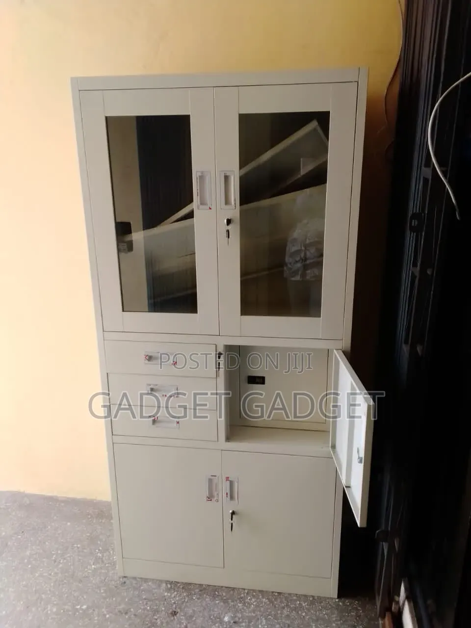 Professional 4-Door Office Cabinet Features Lockable Glass
Display
