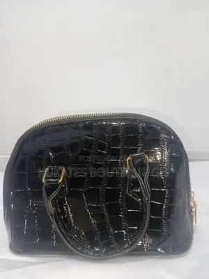 A Black Patent (Glossy) Crocodile-Embossed Handbag.