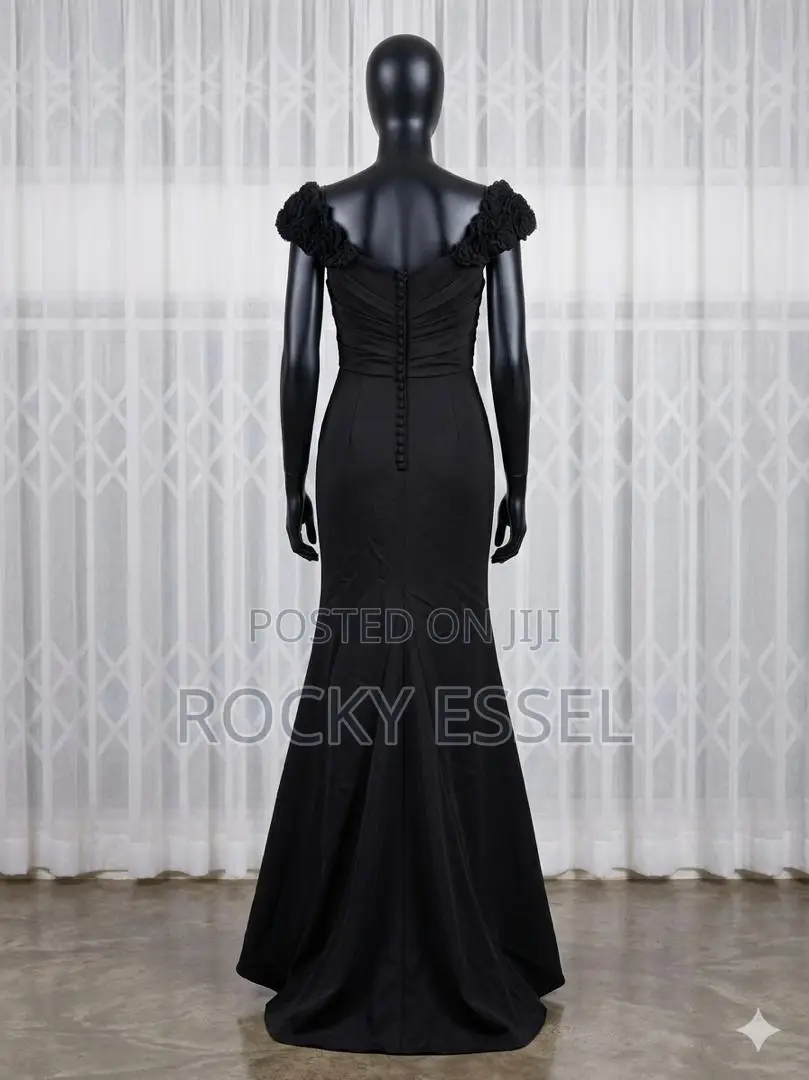 Elegant Black Off-the-Shoulder Evening Gown With Rosette Details