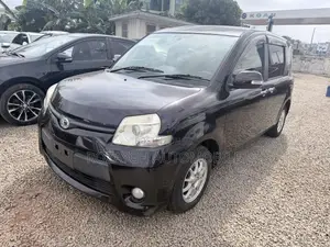 Toyota Sienta 2013 Brown