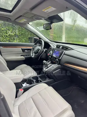 Honda CR-V Touring 4dr SUV AWD (1.5L 4cyl CVT) 2017 Burgundy