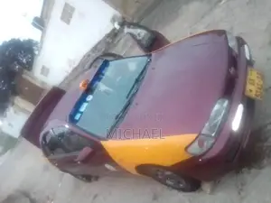 Nissan Almera 1998 Burgundy
