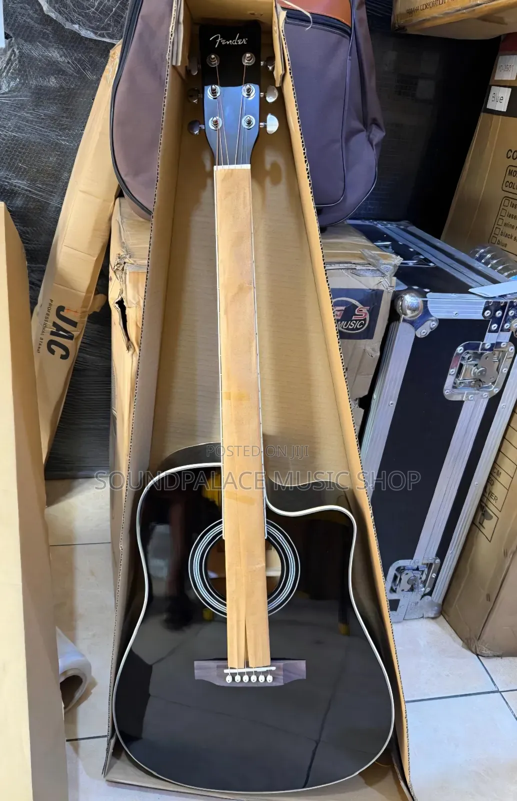 Fender Brand Acoustic Guitar With a Glossy Black Finish.