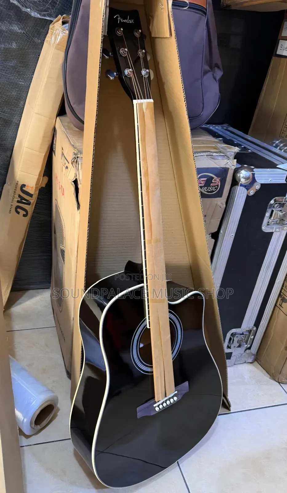 Fender Brand Acoustic Guitar With a Glossy Black Finish.