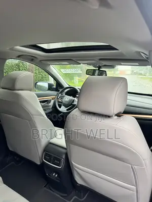 Honda CR-V Touring 4dr SUV AWD (1.5L 4cyl CVT) 2017 Brown