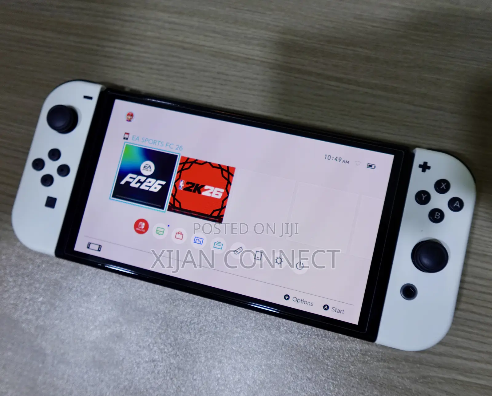 Nintendo Switch OLED With Protective Glass + FC 26 NBA 2K26 Catridge