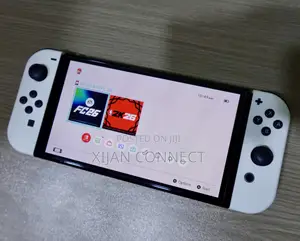 Nintendo Switch OLED With Protective Glass + FC 26 NBA 2K26 Catridge