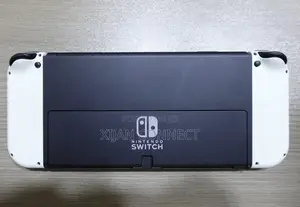 Nintendo Switch OLED With Protective Glass + FC 26 NBA 2K26 Catridge