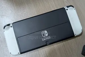 Nintendo Switch OLED With Protective Glass + FC 26 NBA 2K26 Catridge