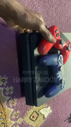 Ps4 Slim With Two Ps4 Controllers