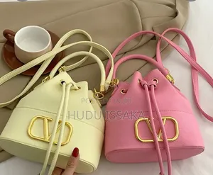 Hand Bags With a Golden Brand Logo for Women