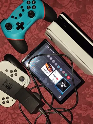 Nintendo Switch Oled With Pro Controller and Original Nintendo Charger